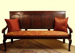 settle with mahogany cross banding